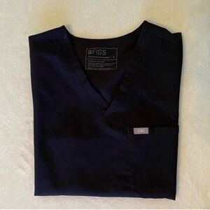 Figs small black Catarina top with high waisted straight leg pants.